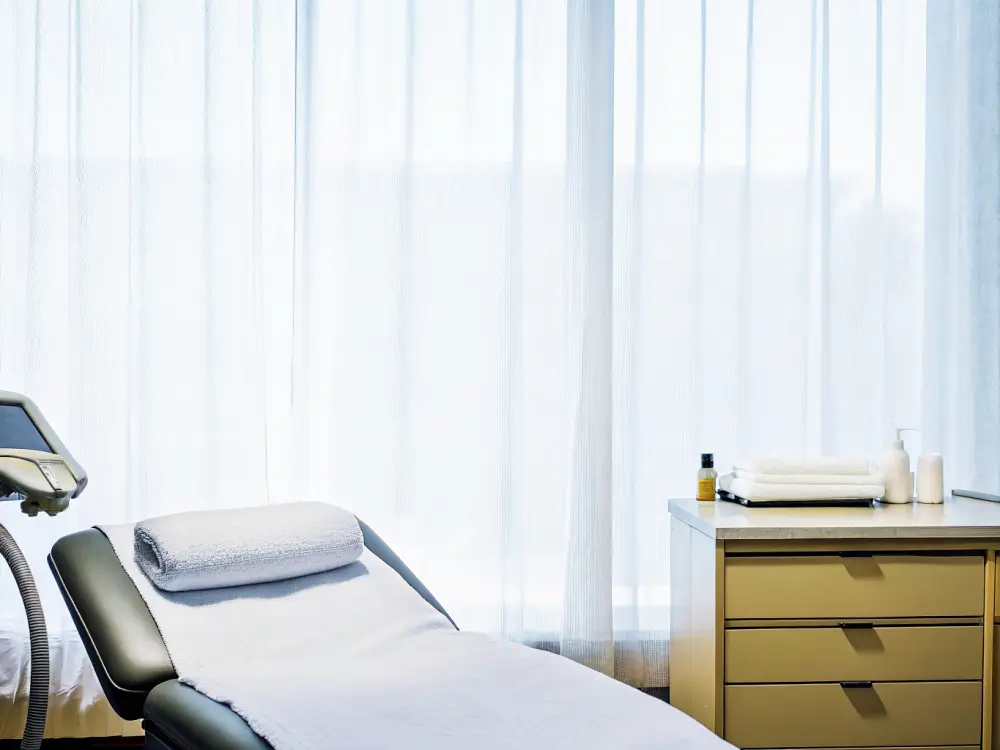 A clean, modern laser and light treatment room